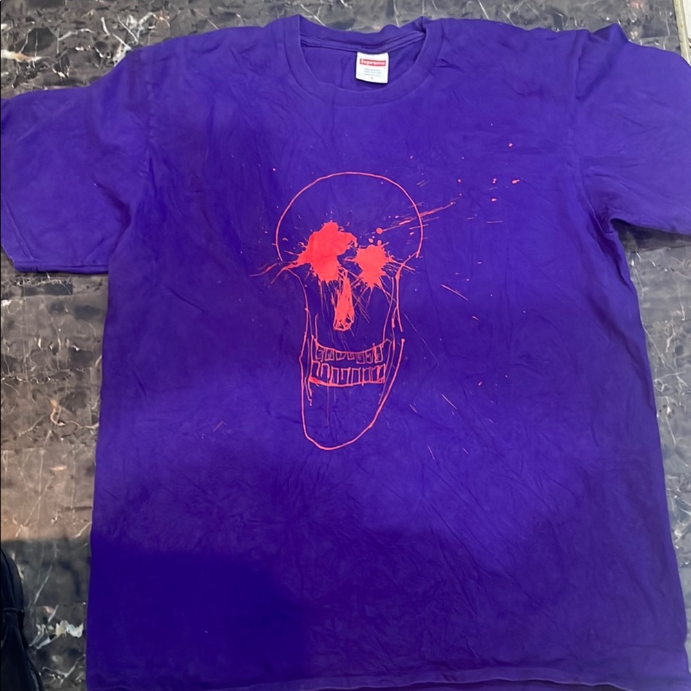 Purple T-Shirt with Orange Skull Design